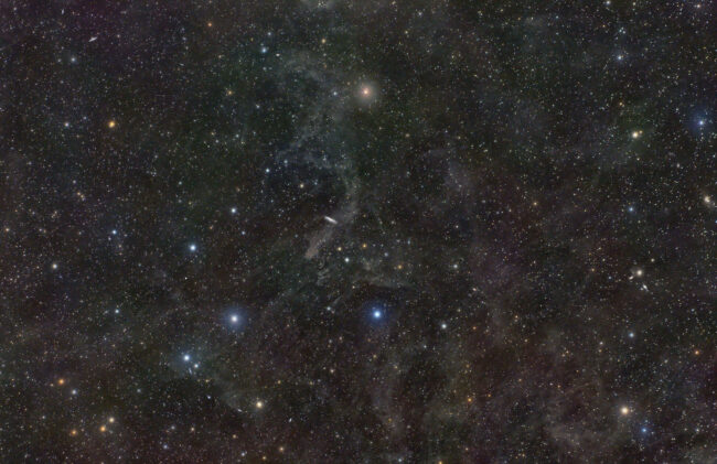 NGC 7497 Derrière la Poussière